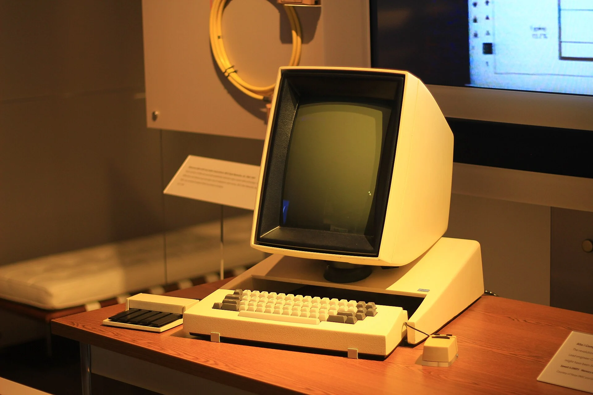 A Xerox Alto workstation with its tall portrait display, keyboard, mouse and chorded keyset.