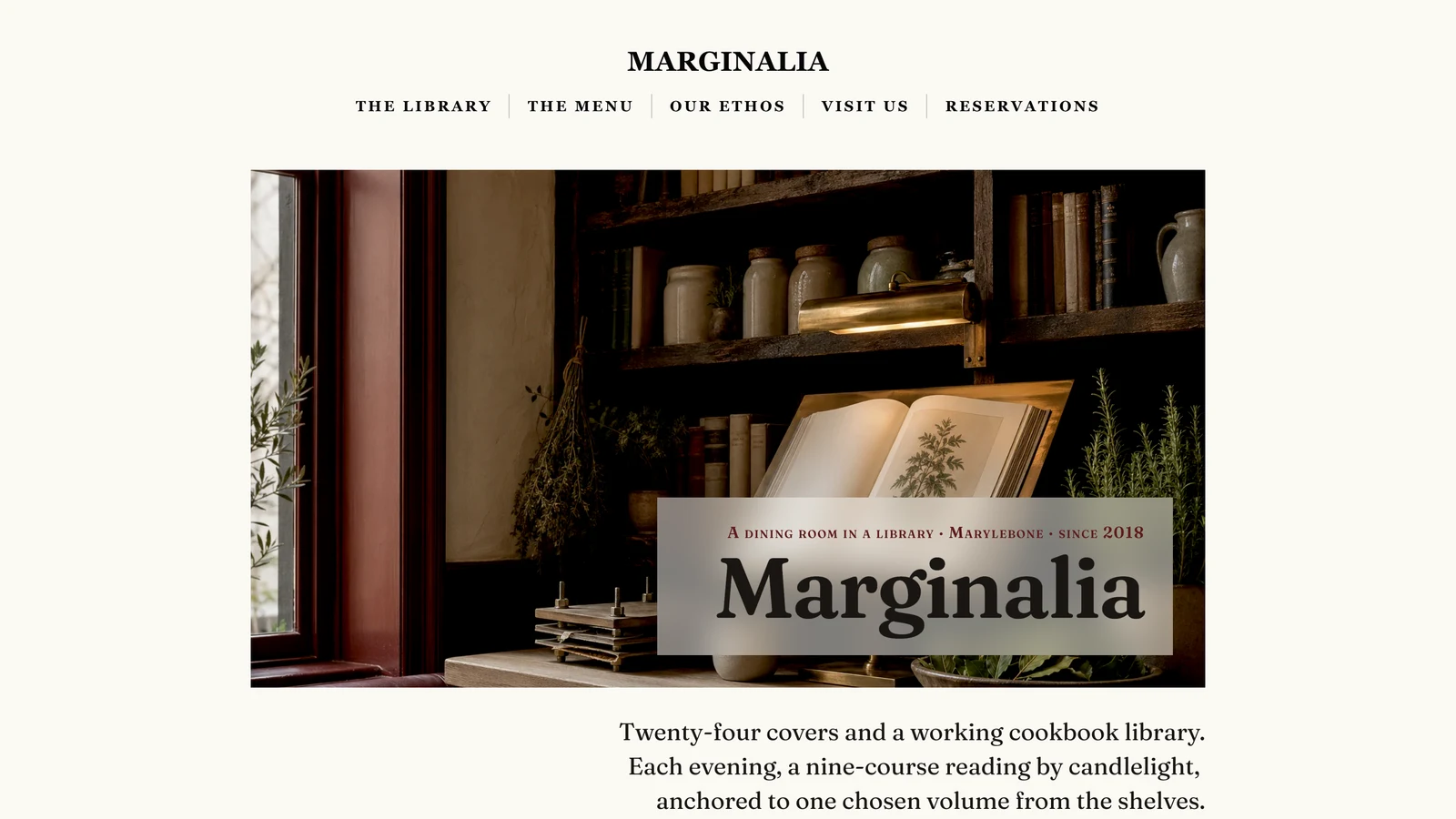 The Marginalia home page: a cream page carrying a photograph of a candlelit shelf of cookbooks and stoneware jars above an open book, the restaurant name laid on a pale card over the photograph's lower corner.